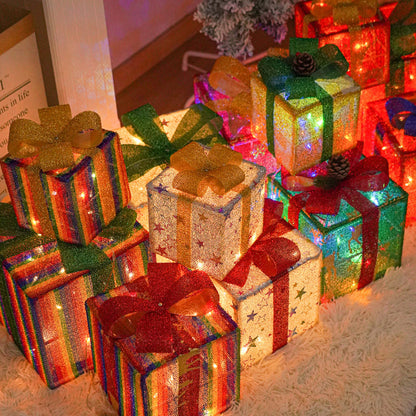 Glowing Christmas gift boxes with colorful ribbons and warm LED lights on a cozy carpet