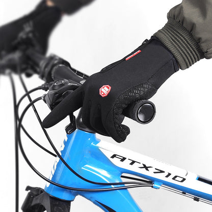 Black waterproof winter riding gloves with anti-skid grip on a blue ATX710 bike handlebar