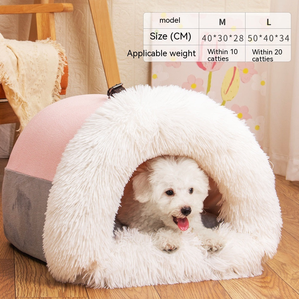 Small white dog resting inside pink and gray plush portable pet bed with fluffy white entrance