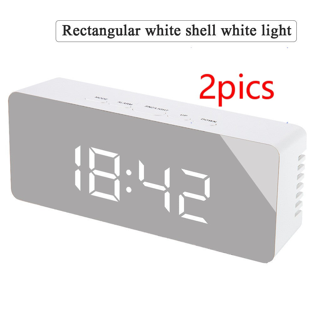 Rectangular white digital LED mirror clock displaying time 18:42 with temperature display