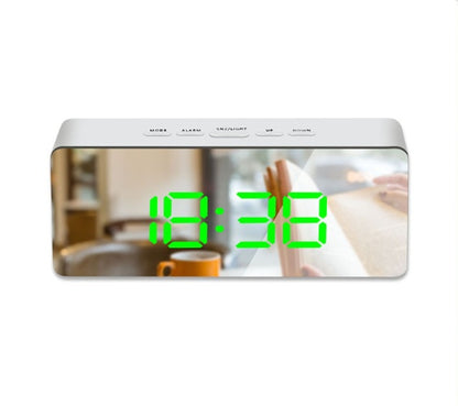 Trendoligy digital LED mirror clock displaying 18:38 with green numbers and temperature feature