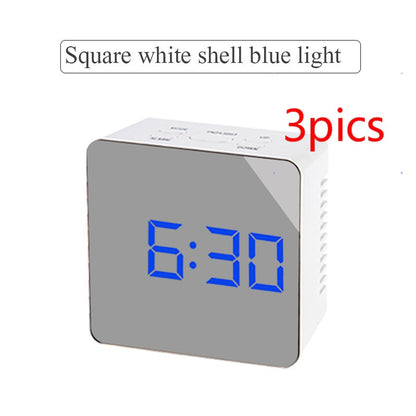 Square digital LED clock with white shell and blue time display showing 6:30