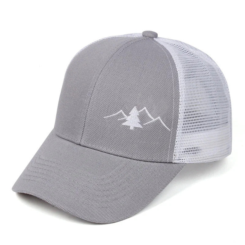 Gray adjustable trucker cap with white mesh back and embroidered mountain and tree design