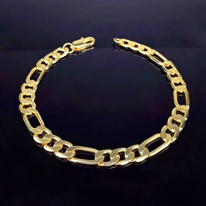 gold figaro chain bracelet with alternating link sizes on black background, men's stylish accessory