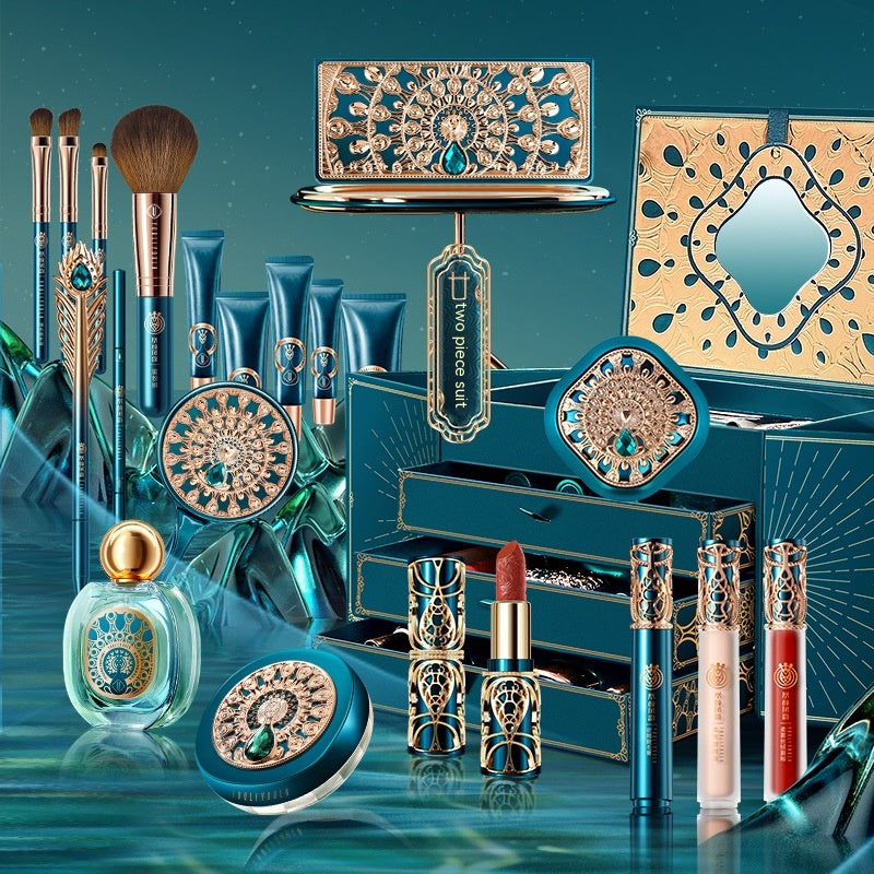 Luxurious multicolor oriental makeup set with brushes, lipstick, tubes, and decorative gold-accented packaging