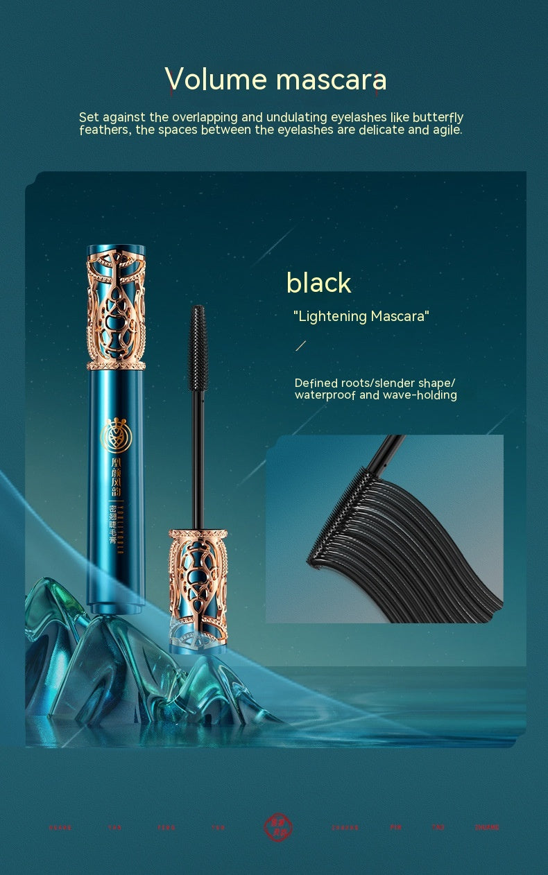 Black volume mascara with ornate blue and gold packaging, waterproof and wave-holding brush