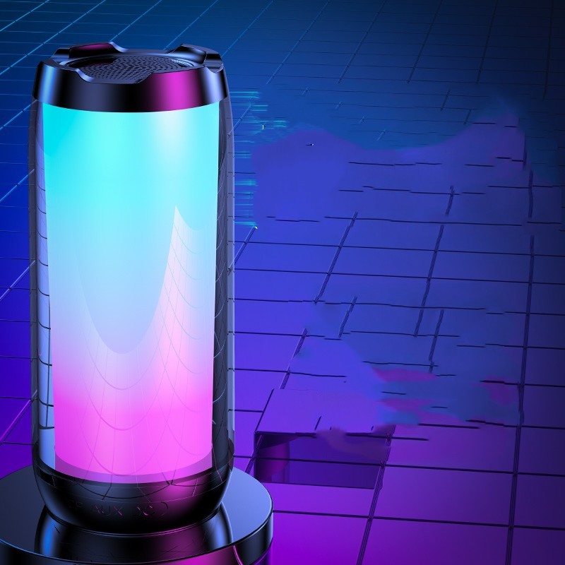 Modern ambient light Bluetooth speaker with gradient blue and pink LED on black surface