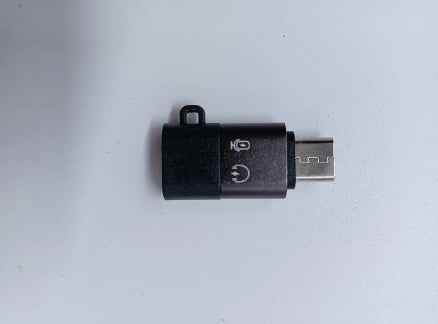 black USB Type-C wireless lavalier microphone adapter with icons on white background