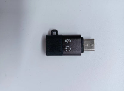 black USB Type-C wireless lavalier microphone adapter with icons on white background