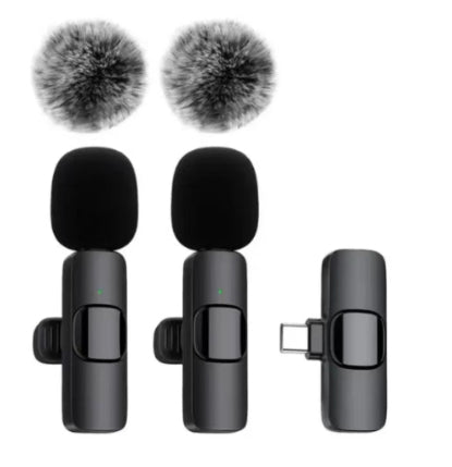 Two black wireless Type-C lavalier microphones with clip mounts, windshields, and a Type-C receiver