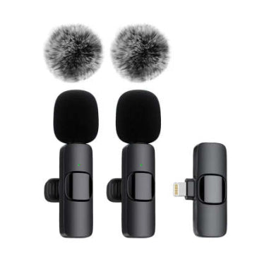 Wireless lavalier microphones with black foam covers, two furry windshields, and a Type-C rechargeable adapter