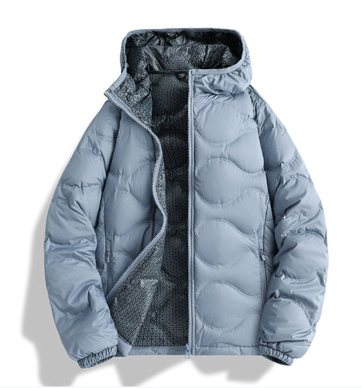 Light blue unisex puffer jacket with hood and zipper, patterned black inner lining
