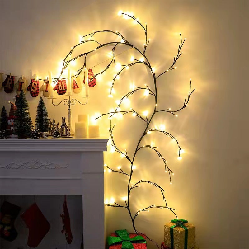Warm white LED birch vine string lights decorating a cozy fireplace mantle with Christmas decor and wrapped gifts