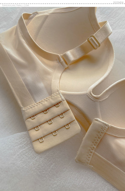 Close-up of beige wireless push-up bra with thin cup and seamless design on white fabric