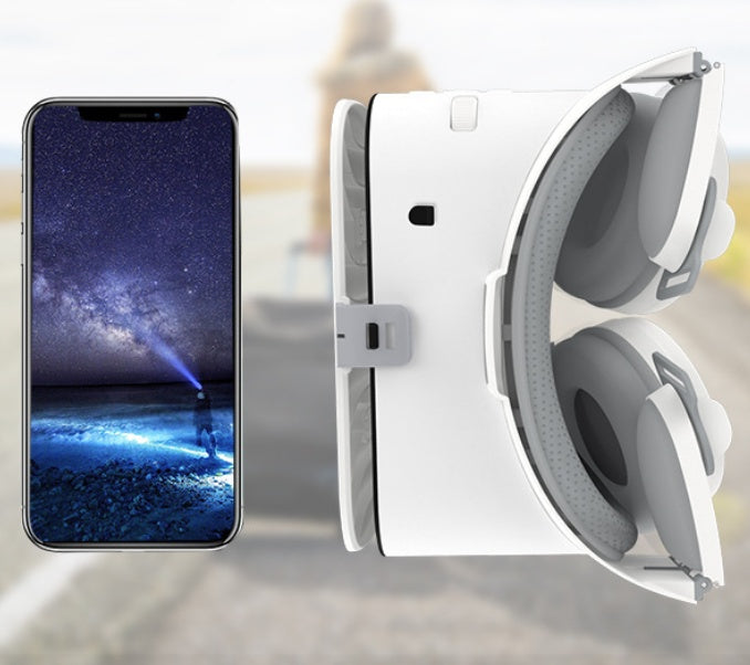 White wireless Bluetooth VR headset with advanced resin lenses beside smartphone showing starry night sky