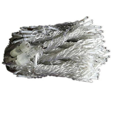 Coiled warm white LED icicle string lights with transparent wires and connectors on white background