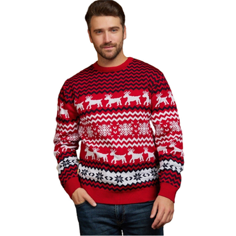 Man wearing red Christmas sweater with white reindeer and snowflake patterns