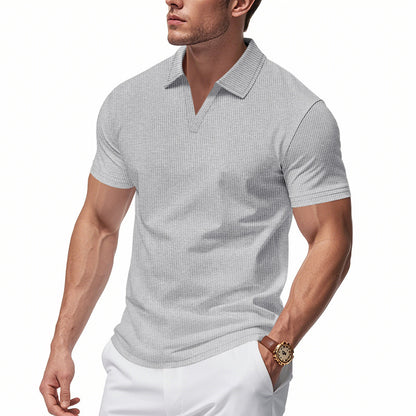 Men's white slim-fit waffle polo shirt with V-neck, short sleeves, lightweight breathable fabric