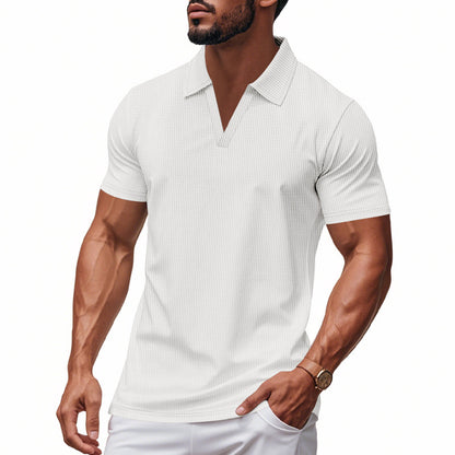 Men's white slim-fit waffle polo shirt with V-neck, short sleeves, and lightweight breathable fabric