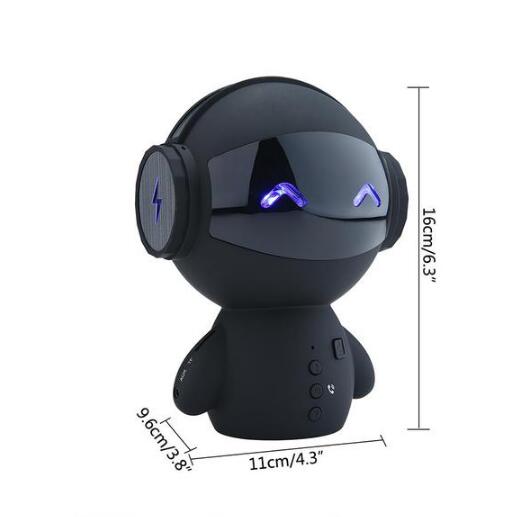 Black robot-shaped Bluetooth speaker with LED eyes, headphones, and control buttons, 16cm tall
