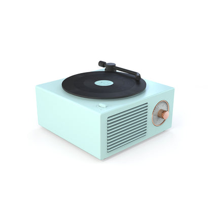 Compact retro mini phonograph Bluetooth speaker in pastel blue with black turntable and copper dial