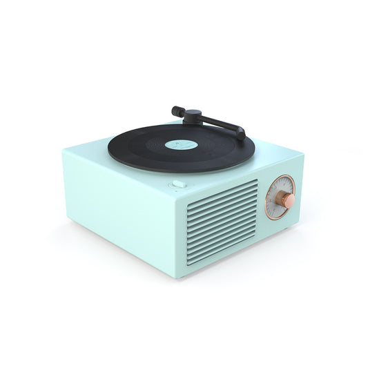 Compact retro mini phonograph Bluetooth speaker in pastel blue with black turntable and copper dial