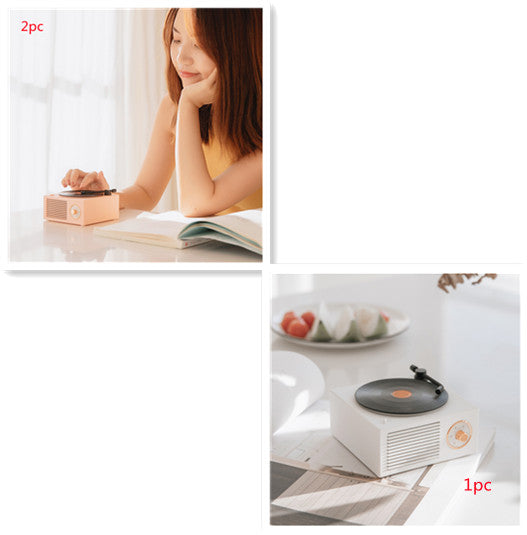 White Trendoligy retro mini phonograph Bluetooth speaker on table with vinyl record player design