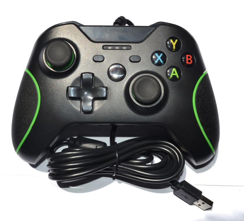 Black wired USB game controller with green accents for Xbox One and PC, featuring dual vibration