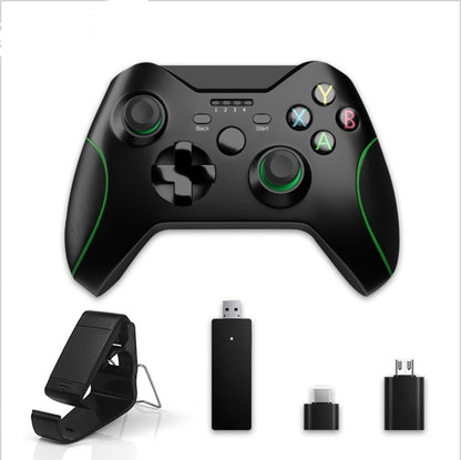 Black wired USB game controller with green accents, compatible with Xbox One and PC, plus USB adapters and clip