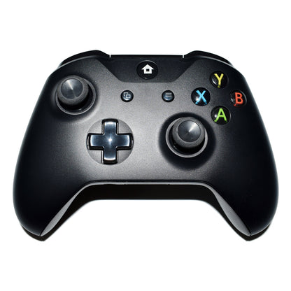 Black wireless gaming controller with colored A, B, X, Y buttons and dual thumbsticks on white background