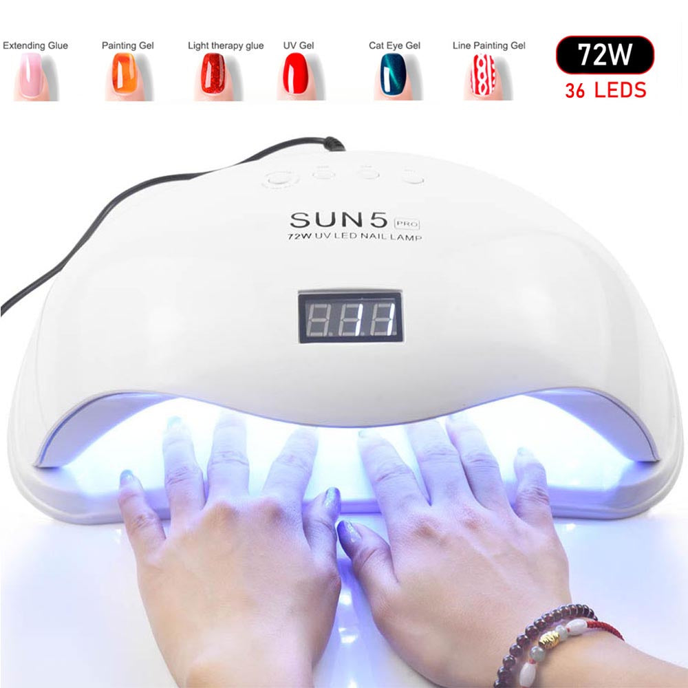 Hands under SUN5 Pro 72W UV LED nail lamp curing gel nails with digital timer display