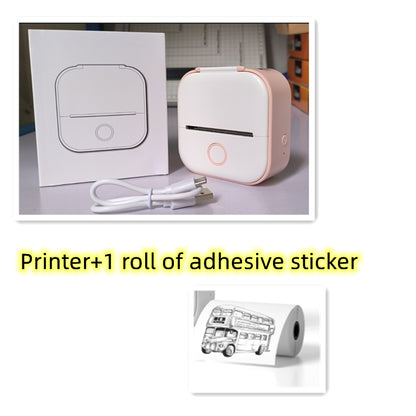 Portable white and pink mini thermal Bluetooth printer with USB cable and box on white surface