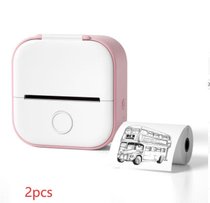 Compact white and pink portable Bluetooth mini thermal printer with inkless printing and printed bus image