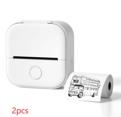 White portable mini thermal Bluetooth photo printer with inkless printing and printed double-decker bus image