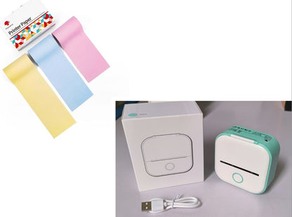 Portable mini thermal printer with USB cable and colorful printer paper rolls in yellow, blue, and pink