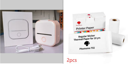Portable white and pink mini thermal printer with USB cable and Phomemo T02 thermal printer paper rolls