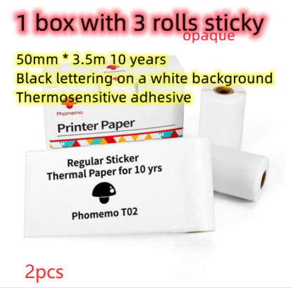 White Phomemo T02 thermal printer paper rolls and packaging with black lettering and colorful accents