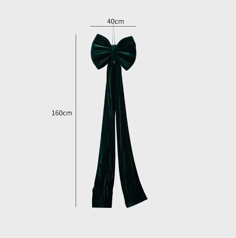 Large dark green velvet Christmas bow decoration, 40cm wide and 160cm long