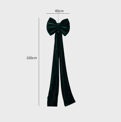 Large dark green velvet Christmas bow decoration, 40cm wide and 160cm long
