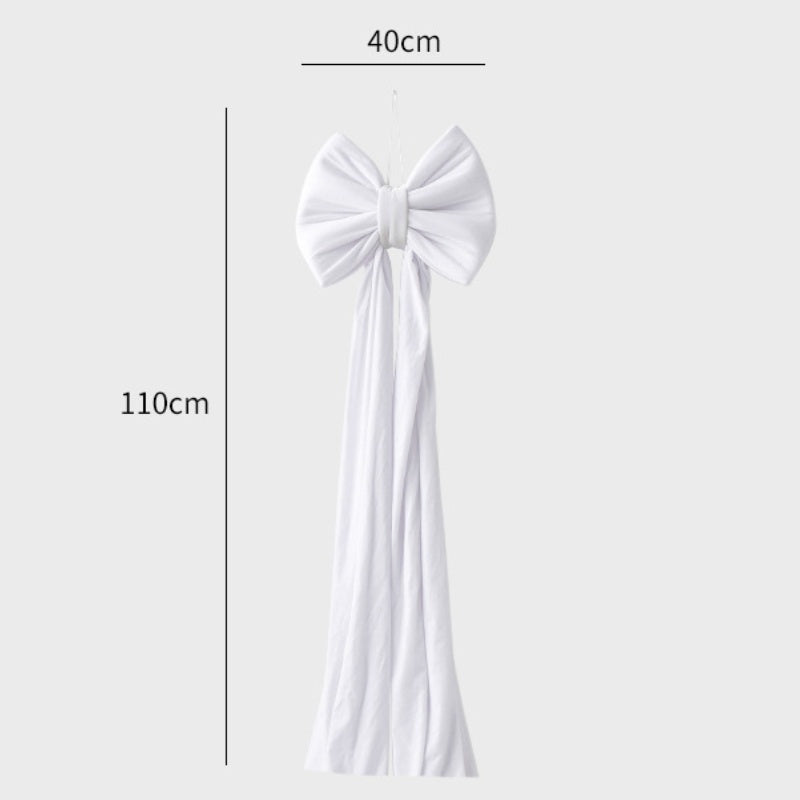 Large white fabric bow decoration with long tails, measuring 40cm wide and 110cm long