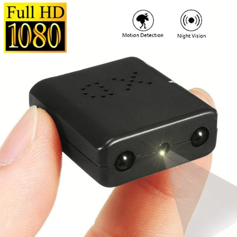 Compact black mini security camera with Full HD 1080p, motion detection, and night vision features