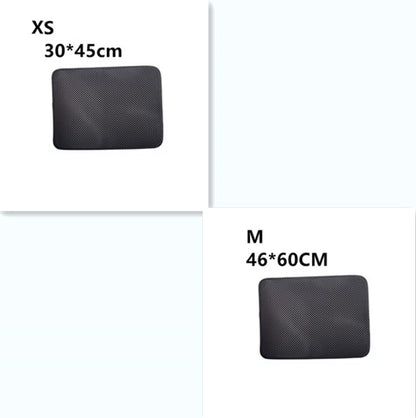 Black waterproof cat litter mats in XS (30x45cm) and M (46x60cm) sizes with textured surface