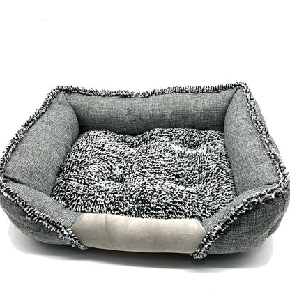 Gray rectangular pet bed with soft textured cushion and cozy furry edges for small dogs and cats