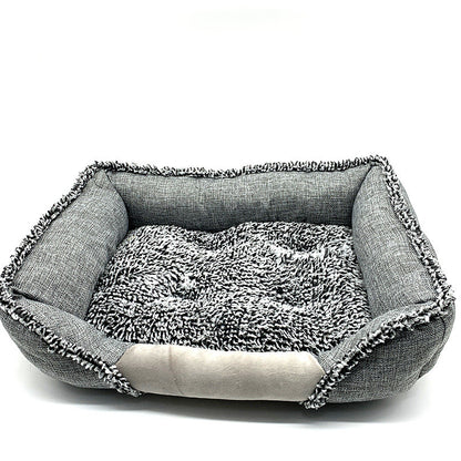 gray rectangular washable pet bed with soft plush cushion and textured fabric sides