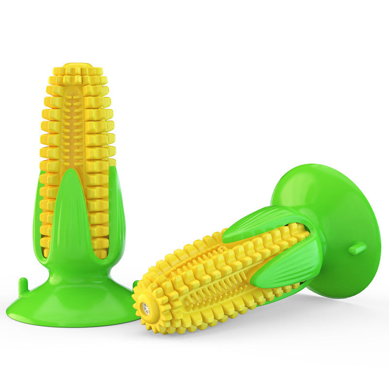 Yellow corn-shaped durable TPR dog chew toys with green bases and textured teeth cleaning design
