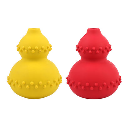 Yellow and red chew-resistant rubber dog treat dispensing puzzle toys with textured bumps
