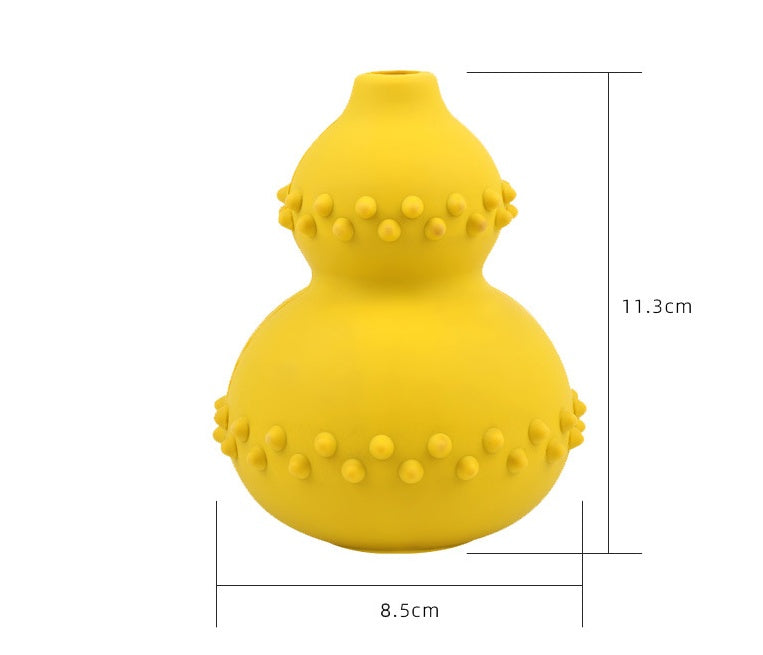 Yellow interactive dog treat dispensing toy made of chew-resistant natural rubber with textured bumps, 11.3cm tall