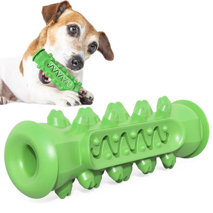 Dog chewing on green textured rubber dog chew toy designed for teeth cleaning and dental health