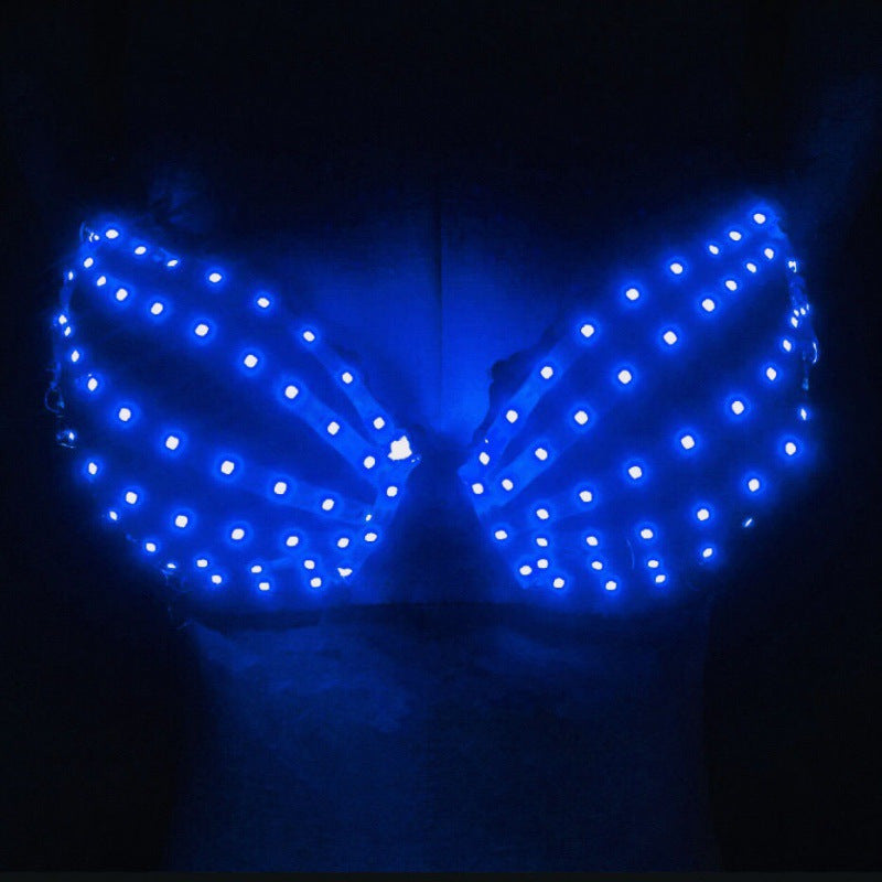 Luminous blue LED light-up bra with dotted pattern on dark background