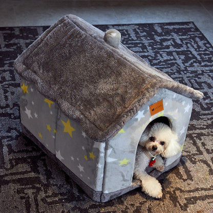 Small white dog peeking out of a cozy star-patterned soft pet house with a plush roof